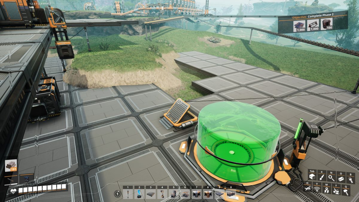 A Jump Pad beside a U-Jelly Landing Pad being placed as a green build hologram in Satisfactory