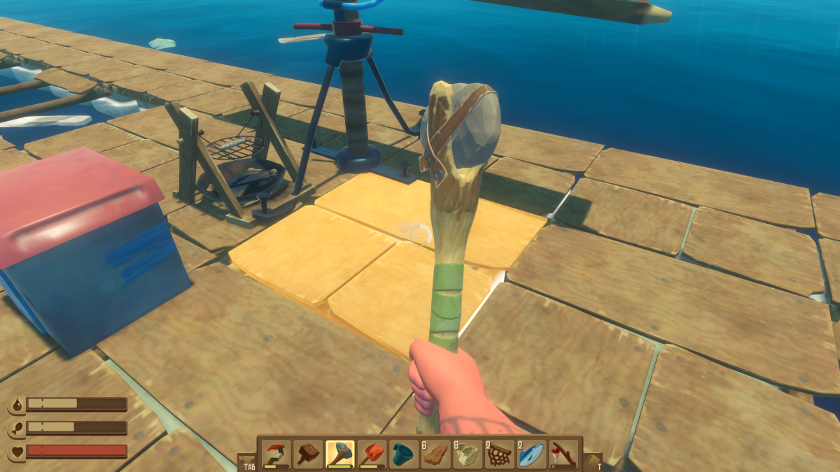 Holding the Stone Axe over foundation tiles on the raft, about to remove them, in Raft