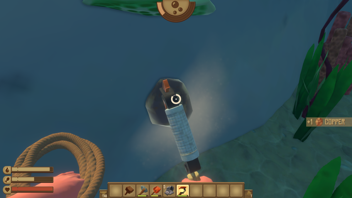 Digging out copper ore underwater with the Plastic Hook near an island in Raft