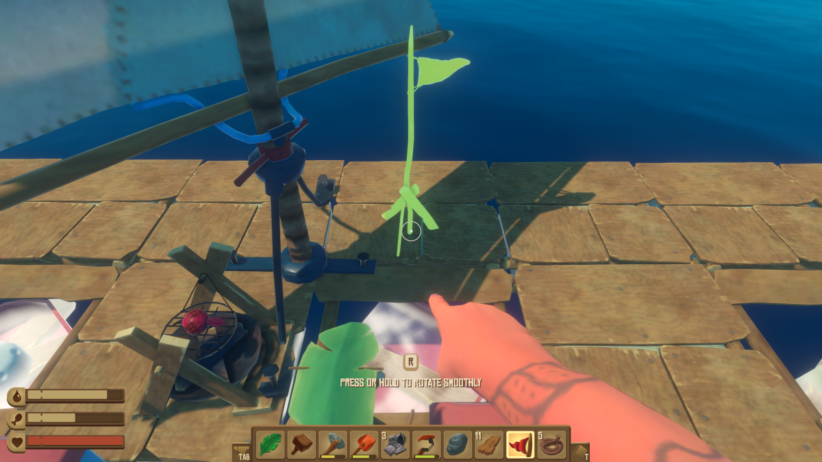Placing a Streamer beside the sail on the raft in Raft to show wind direction