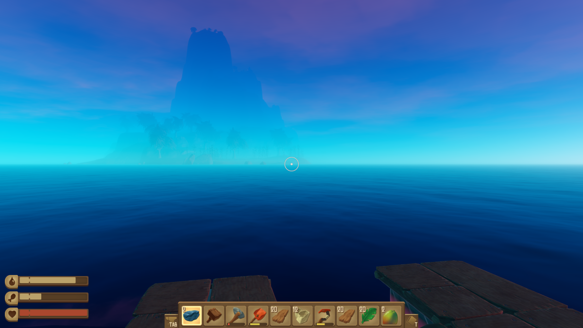 A large mountainous island looming on the horizon at dusk seen from the raft in Raft